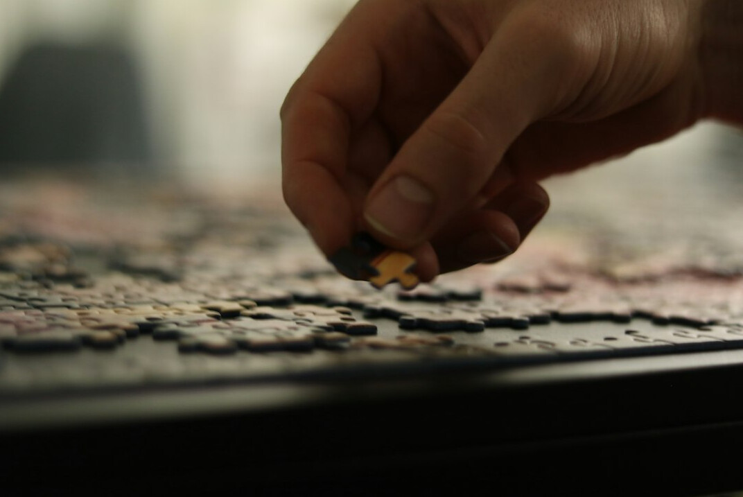 person solving puzzle